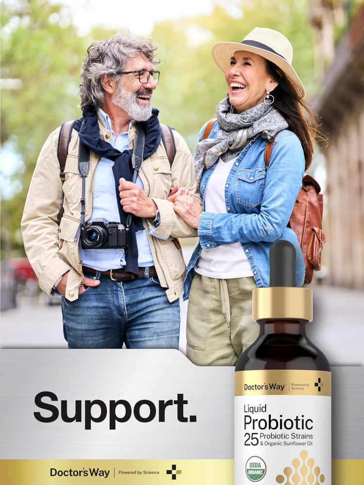 Older couple laughing and holding hands while walking outdoors next to a Doctor's Way Liquid Probiotic bottle.