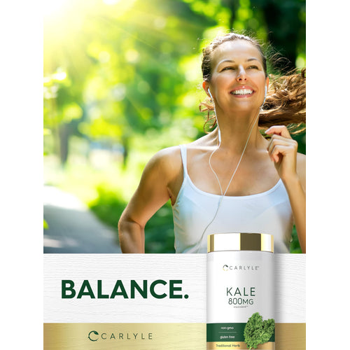 View 6 Smiling woman jogging in a sunny park with a Kale supplement bottle.