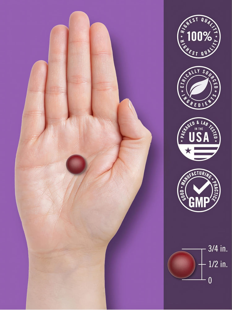 Carlyle Melatonin 2.5 mg gummy, 3/4 in. wide and 1/2 in. high, held in an open palm. Quality badges on the side.