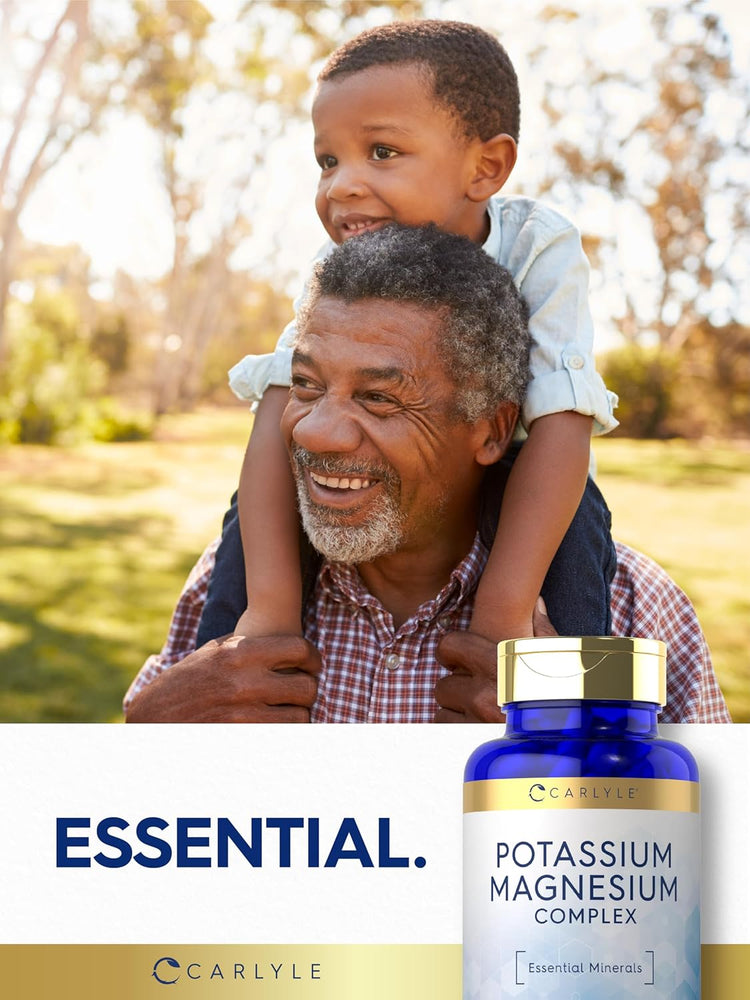 Older Black man carrying a smiling young Black boy on his shoulders outdoors, next to a Carlyle Potassium Magnesium Complex bottle.
