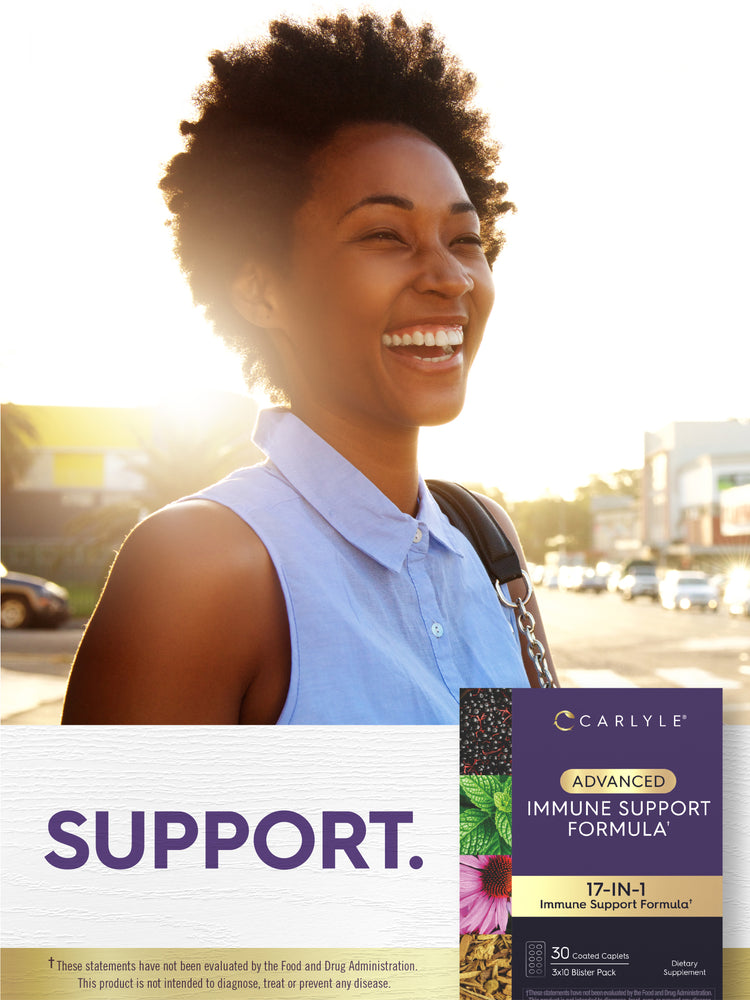 Lifestyle image of smiling adult outdoors with Carlyle Advanced Immune Support Formula package nearby and text stating SUPPORT