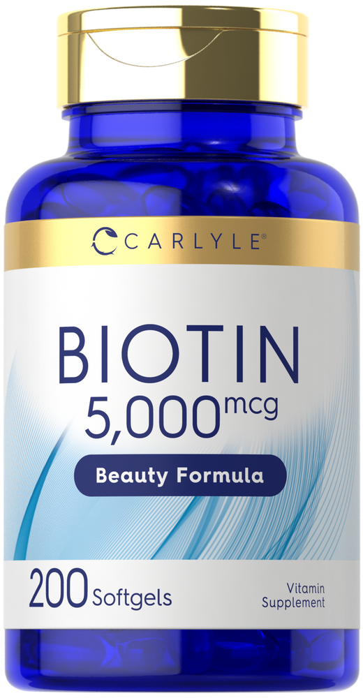 A hand holding a bulk scale of 200 Biotin 5000mcg softgels.