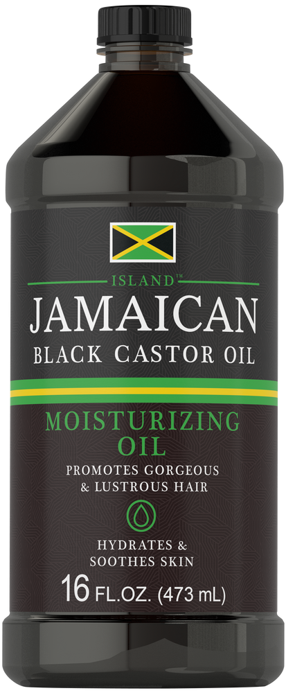Bottle of Jamaican Black Castor Oil, 16 FL.OZ. (473 mL), resting on hand for scale.
