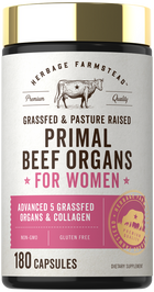 Hand holding a bottle of Primal Beef Organs supplements, 180 capsules, designed for women. Focus on health and wellness benefits.