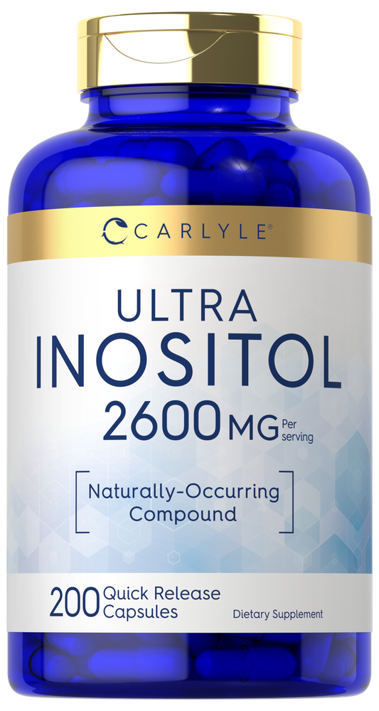 Hand holding Quick Release Capsules, 2600 mg per serving, 200 count, on a bulk scale.