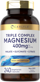 Carlyle Triple Complex Magnesium 400mg with 240 vegetarian capsules, shown on a hand scale for size reference.