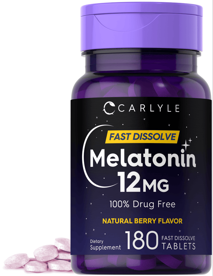 Light pink, round tablets of Carlyle Melatonin 12MG Fast Dissolve held in hand, showcasing their size and texture.