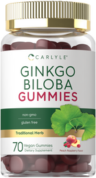 Hand holding a bulk scale of 70 vegan Ginkgo Biloba gummies with peach raspberry flavor.