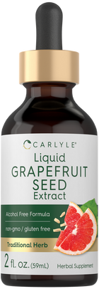 A 2 fl. oz. (59mL) dropper bottle of liquid grapefruit seed extract, shown for scale against a hand.