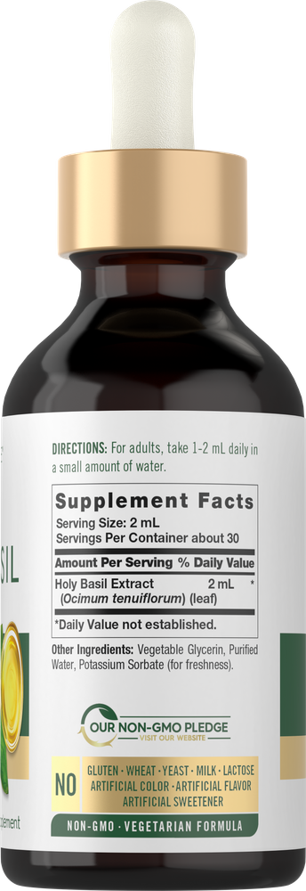 Carlyle Holy Basil Liquid Extract 2 fl oz dropper bottle shown on a hand to indicate scale.