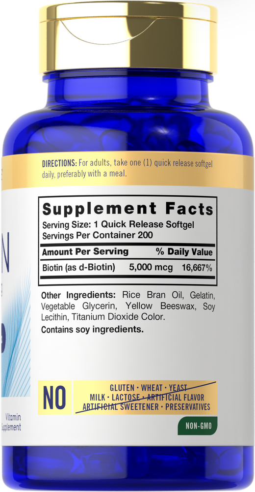 Carlyle Biotin 5000mcg, 200 softgels bottle held in hand, showcasing size and scale for easy understanding.