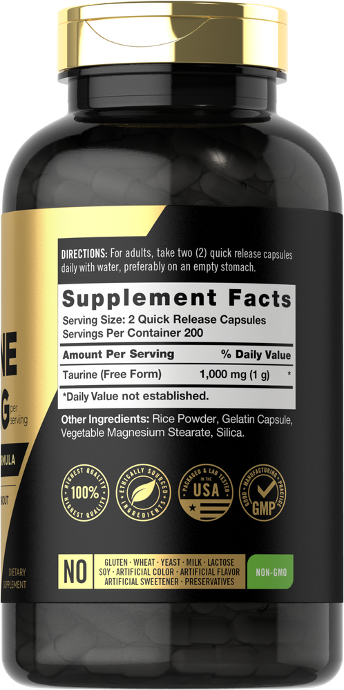 White capsules labeled Taurine 1000 mg, providing 1000 mg per each two-capsule serving, displayed on a hand scale.
