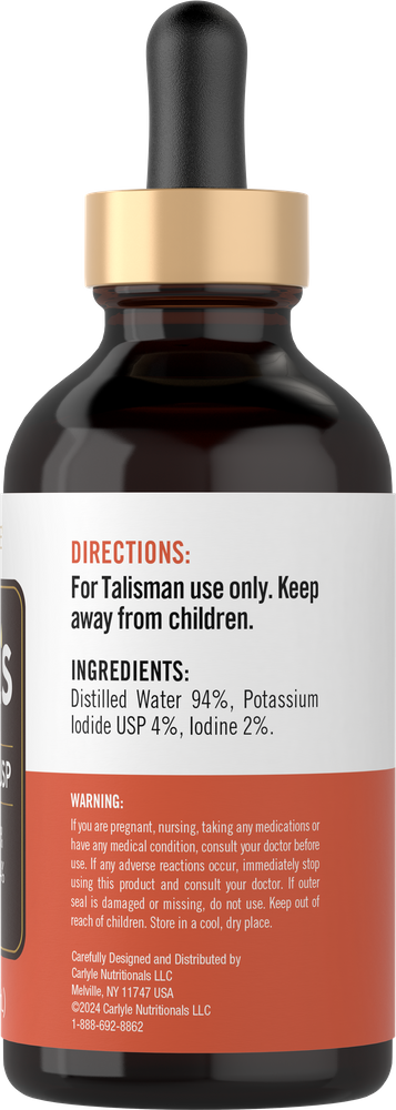 Carlyle Lugols Iodine 4 fl oz liquid in a dropper bottle, photographed on a scale to show the bottle's size and weight comparison.