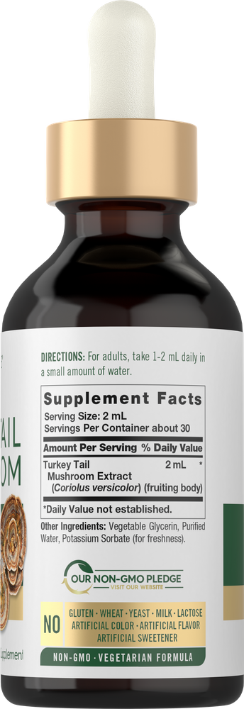 TurkeyTail Mushroom Liquid Extract, 2 fl oz, in a dropper bottle held in hand.