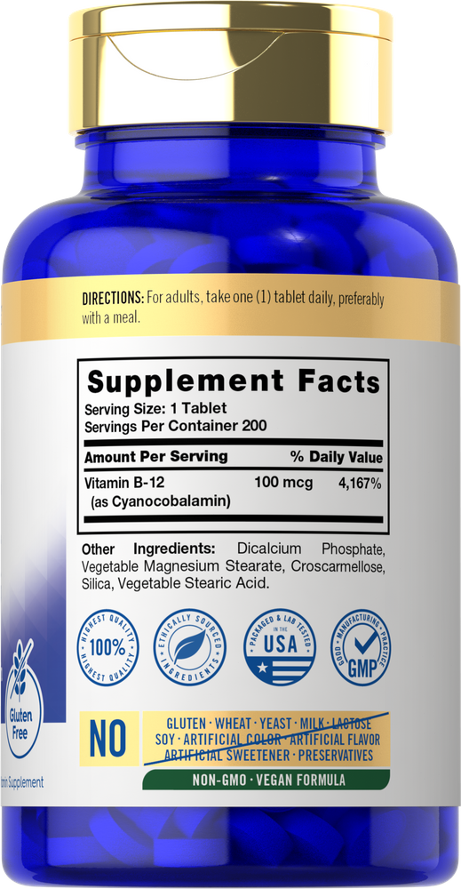 A hand holds a scale with a bulk amount of B-12 100 mcg tablets, emphasizing the high quantity and dosage.