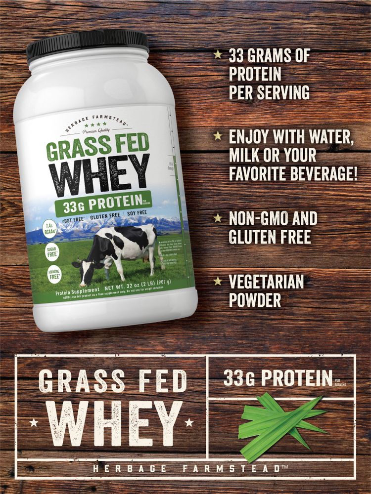 Herbage Farmstead Grass Fed Whey Protein powder in a 32 oz (2 LB) tub, shown on a hand scale for size reference.