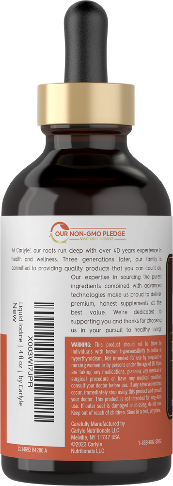 A 4 fl oz bottle of Carlyle Liquid Iodine shown on a hand-held scale, emphasizing its weight and size.