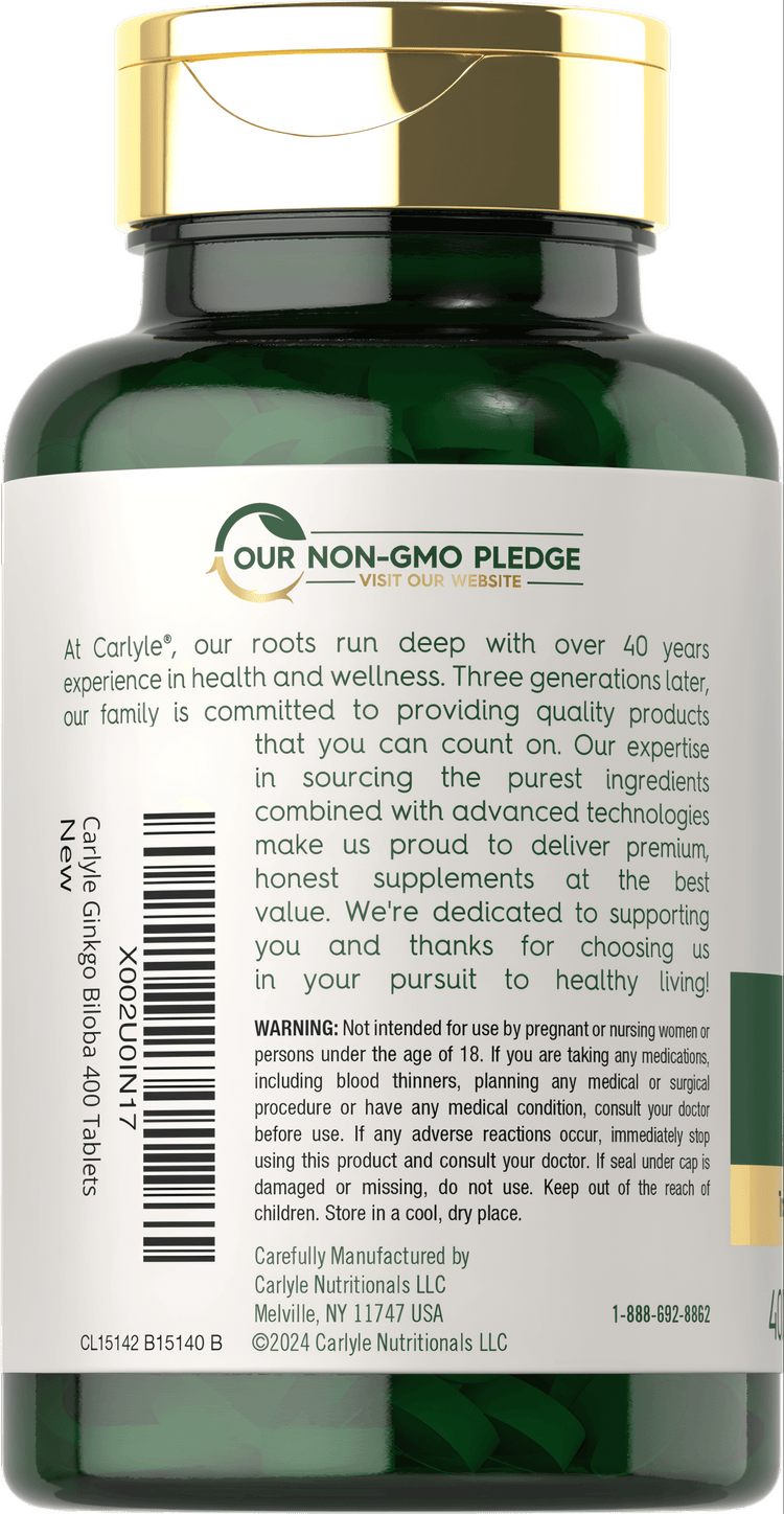 A hand holds a bottle of Carlyle Ginkgo Biloba 3000 mg with 400 green tablets, highlighting its bulk quantity for supplements.