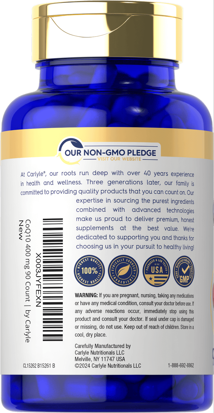 Hand holding Carlyle CoQ10 400 mg vegetarian capsules, bottle on a scale indicating bulk packaging.