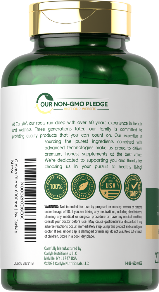 Carlyle Ginkgo Biloba 6000 mg capsules displayed on a scale held by hand, reflecting bulk quantity and supplement measurement.