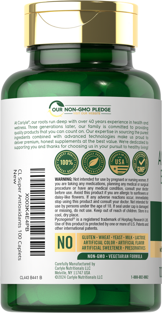 A hand holding a bottle of Carlyle Super Antioxidants, containing 100 caplets.