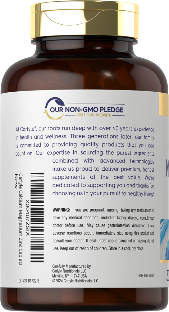 A bottle of Carlyle Calcium Magnesium Zinc 300 Caplets placed on a hand scale.