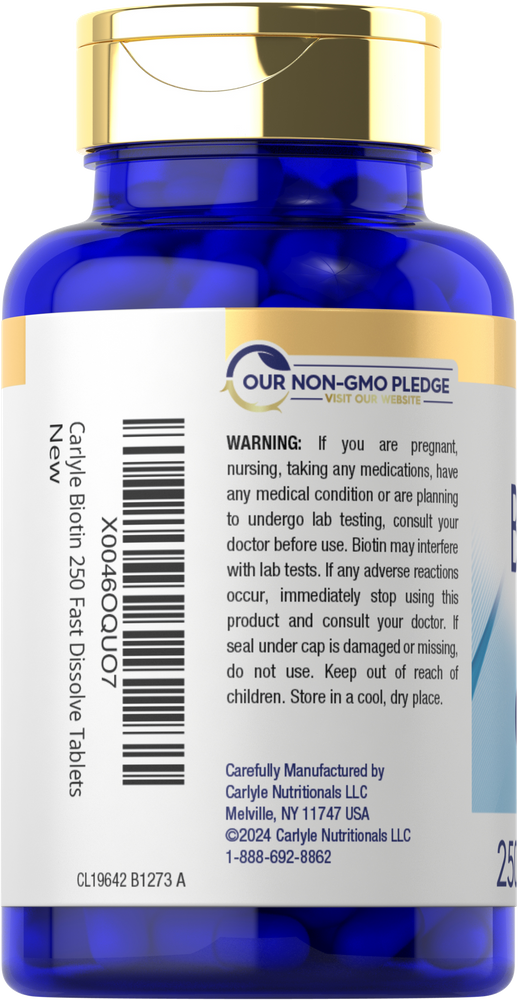 Hand holding Carlyle Biotin 250 mcg tablets, fast dissolve formula for easy consumption and nutritional support.