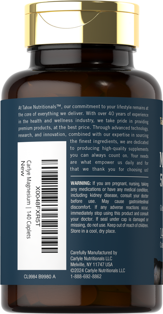 Hand holding a bottle of Carlyle Magnesium 140 Caplets, ideal for supporting bone and muscle health, shown on a scale for reference.