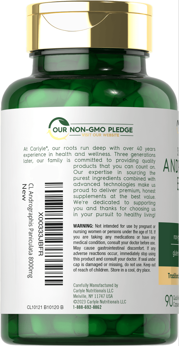 Bottle of CL Carlyle Andrographis Paniculata Extract 8000 mg with 90 quick-release capsules on a hand scale.