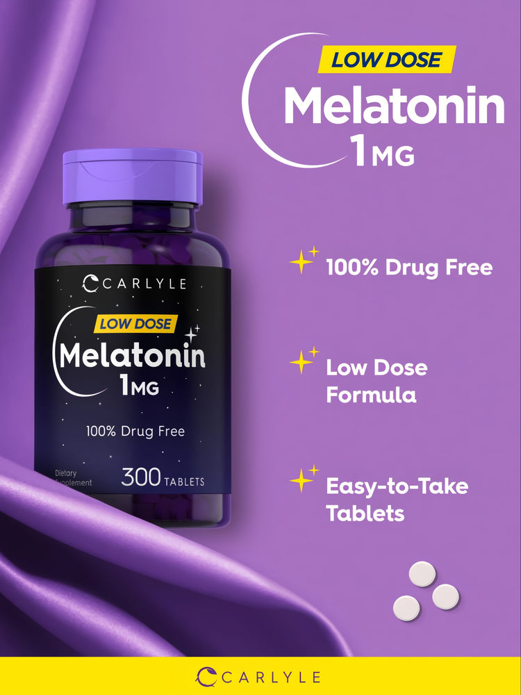 Three small round white tablets of Melatonin 1 mg on a hand scale.