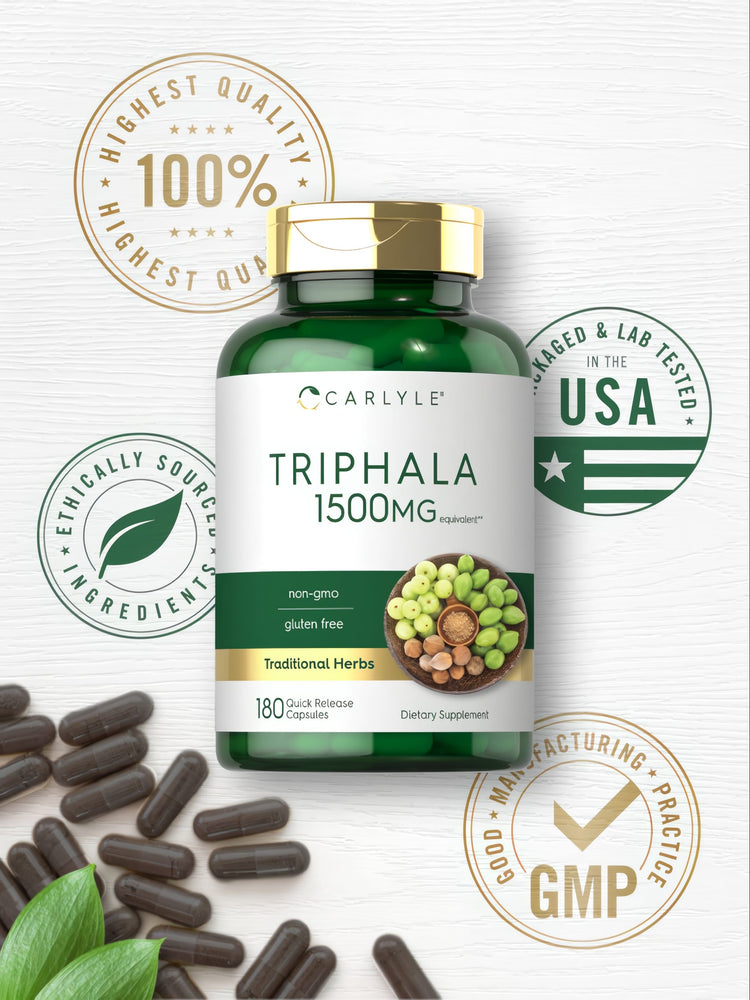 Dark brown Quick Release Capsules of Triphala 1500 mg placed in a hand, showcasing size and quantity for scale.