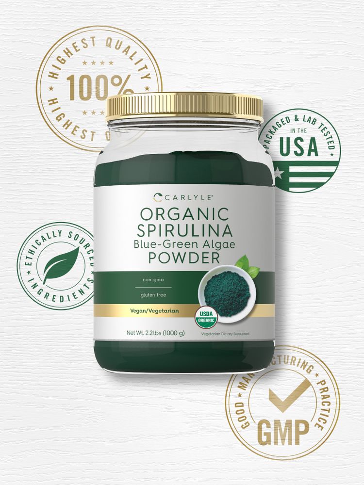 Carlyle Organic Spirulina Blue-Green Algae Powder weighs 2.2 lbs (1000 g) in the hand-scale image.