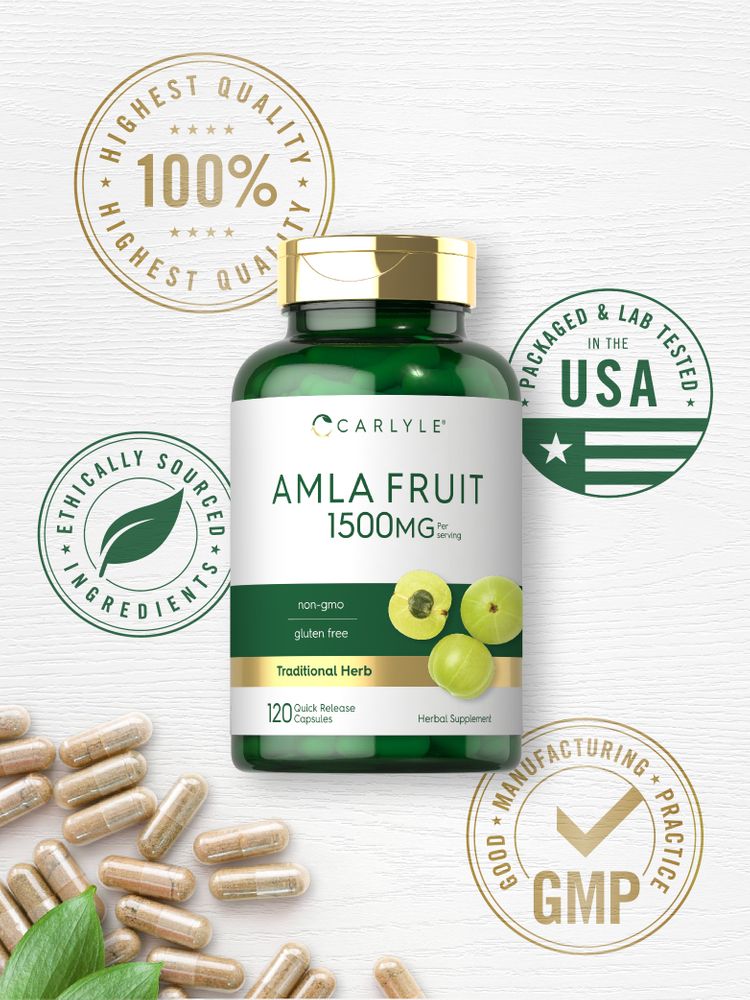 Hand holding a bottle of quick release 1500 mg Amla Fruit capsules.