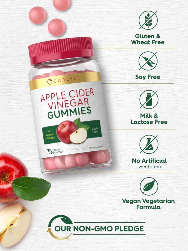 75 pink Apple Cider Vinegar Gummies in a clear jar and scattered, accompanied by whole and sliced red apples.