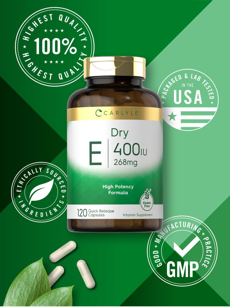 Three white Quick Release Capsules next to a Carlyle Dry E 400 IU 268mg bottle containing 120 capsules.