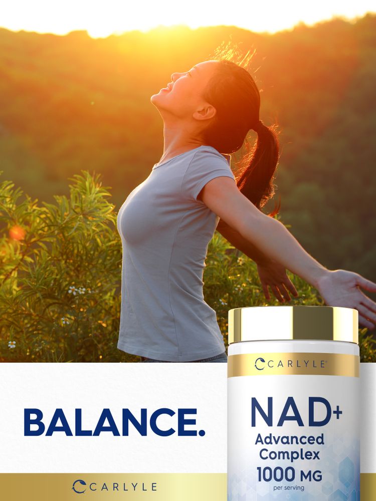 Young adult woman smiling with arms outstretched in the sun next to a NAD+ Complex bottle.