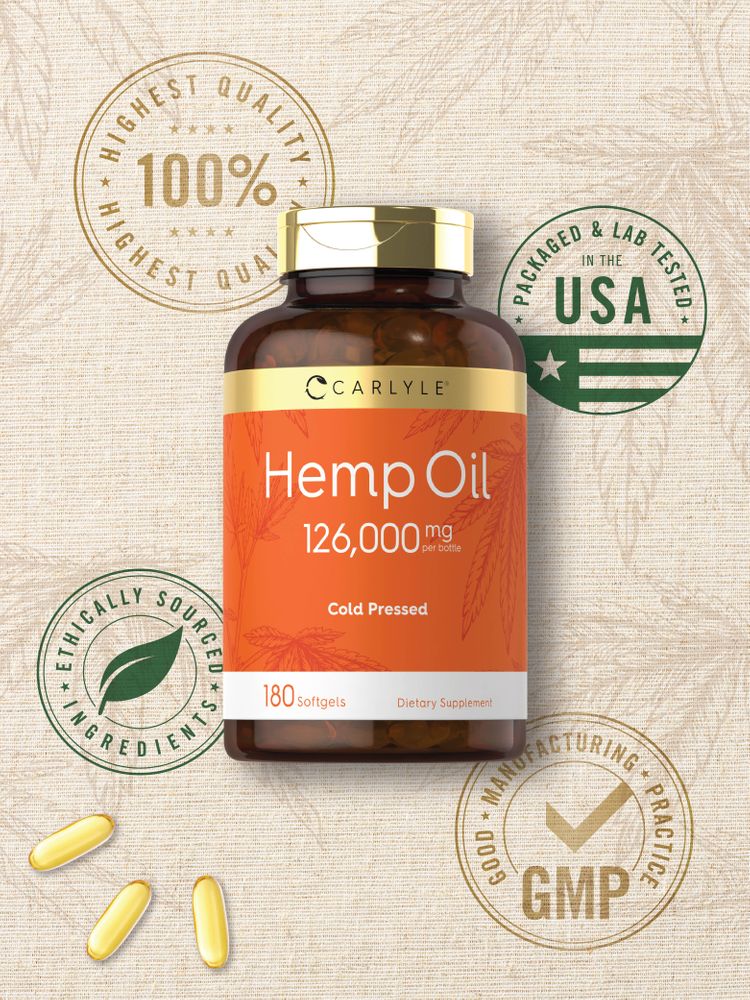 A hand holding three yellow bottles of Carlyle Hemp Oil 126,000 mg, with a total of 180 softgels.