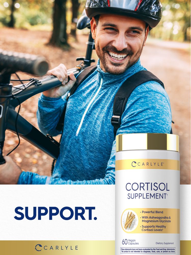 Carlyle Cortisol Supplement bottle containing 60 vegan capsules is shown on a hand scale.