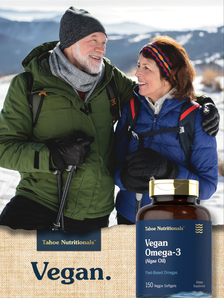 Hand holding Tahoe Nutritionals Vegan Omega-3 Algae Oil bottle, 150 Veggie Softgels.