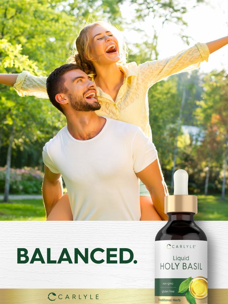 Young adult man giving young adult woman a piggyback ride, both laughing, with a bottle of Carlyle Liquid Holy Basil and text 'BALANCED.'