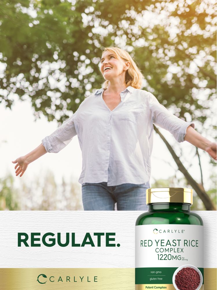 Carlyle Red Yeast Rice Complex capsules, 1220 mg, shown for scale in hand.