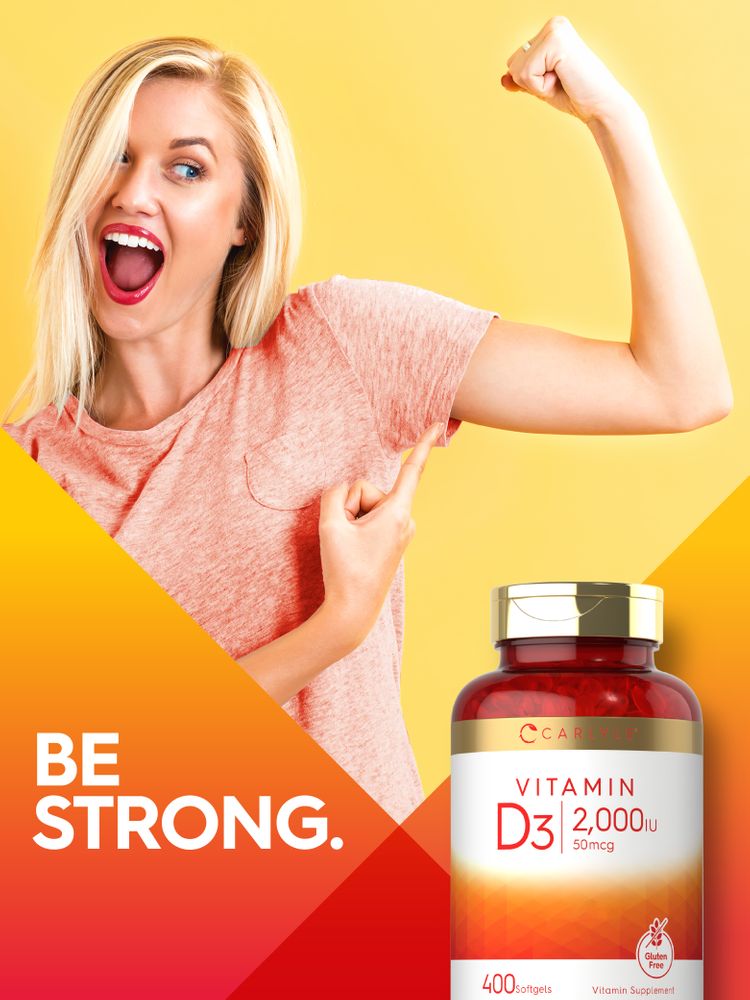 Bottle of Vitamin D3 2,000 IU containing 400 softgels is shown in hand.