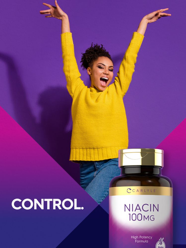 A young woman cheers with arms raised next to a bottle of Niacin.