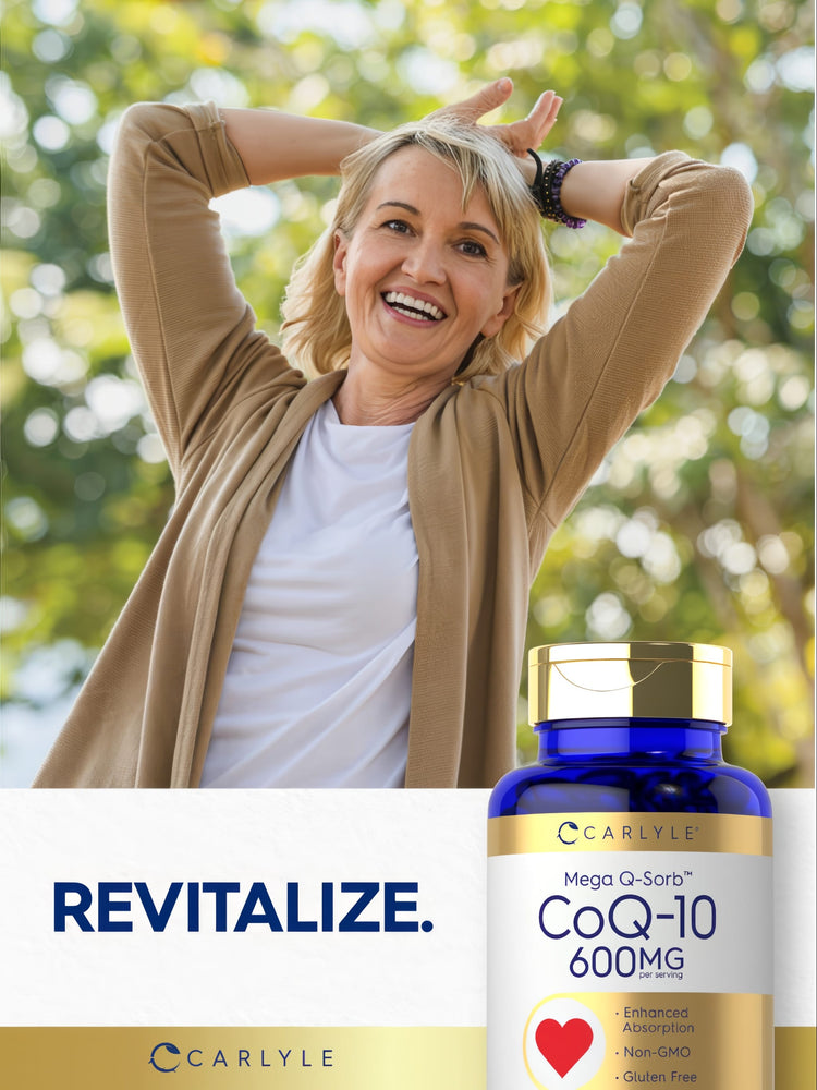 Middle-aged woman smiling with arms behind head next to Carlyle CoQ-10 bottle, looking content.