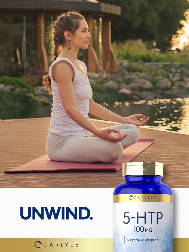 Woman meditating on a mat by the water near a Carlyle 5-HTP bottle.