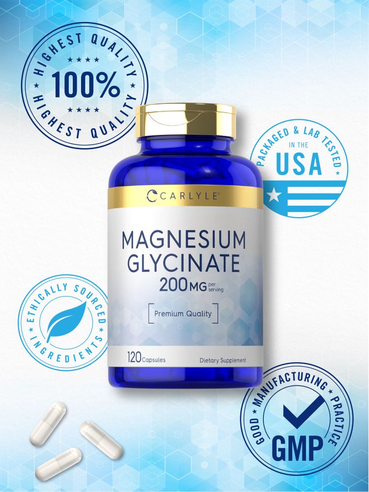 A close-up of three white Magnesium Glycinate 200mg capsules on a hand scale.