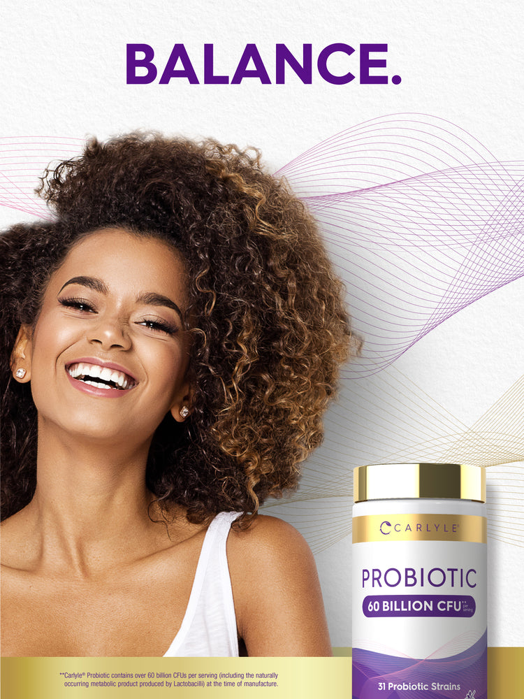 A woman with curly hair smiles next to a Carlyle Probiotic 60 Billion CFU bottle; text reads 'BALANCE.'