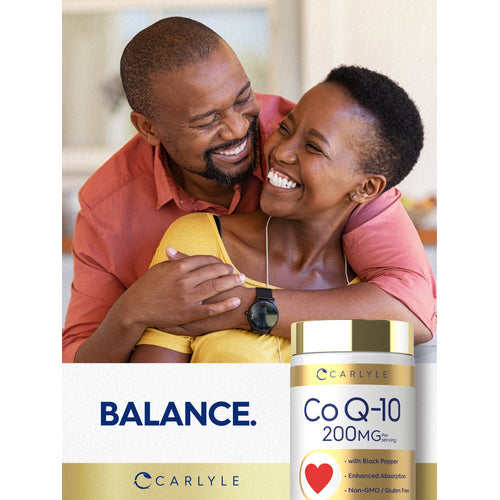 View 6 A Black couple hugging and laughing, a Carlyle Co Q-10 bottle is in the foreground.