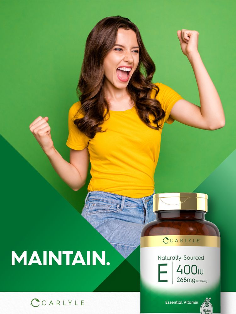 A young woman celebrates with raised fists beside a Carlyle Natural Vitamin E bottle.