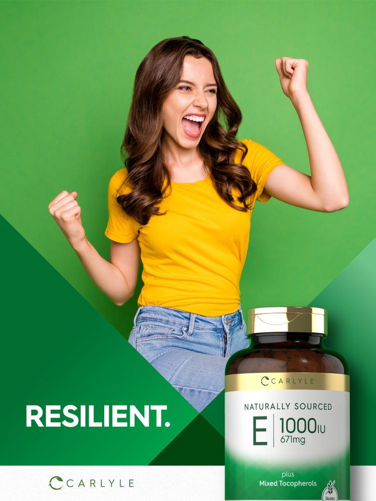 A bottle of Carlyle Vitamin E 1000 IU, 671mg, placed on a hand scale.